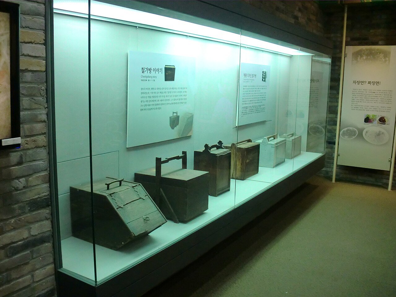 Exhibit of metal delivery boxes at the jjajangmyeon museum in Incheon