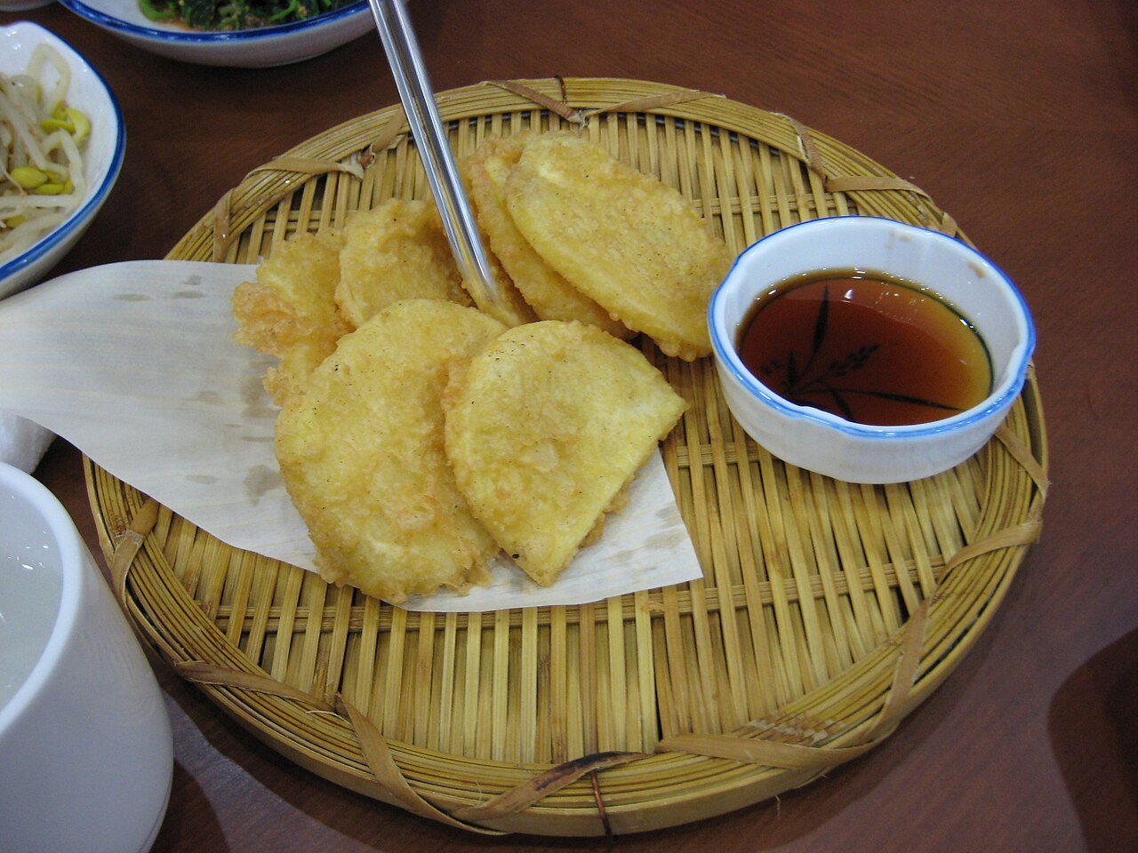 Golden fried sweet potato twigim, a Korean street food fritter