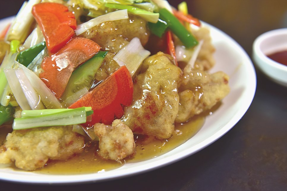 Chapssal-tangsuyuk, the puffier glutinous rice version of Korean sweet and sour pork, with sauce served on the side