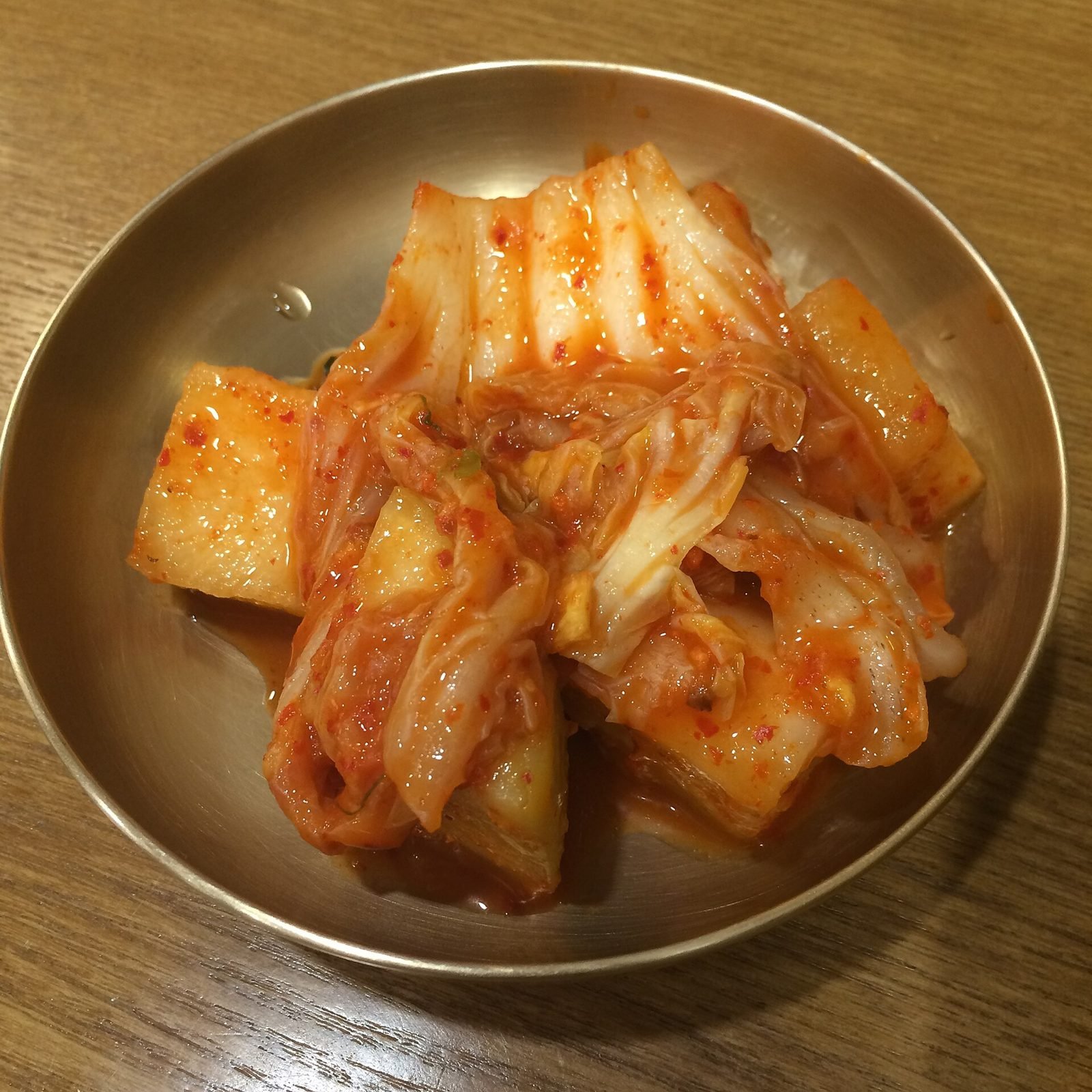 Napa cabbage kimchi and cubed radish kimchi plated together